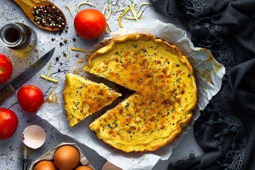 Vegetable quiche, tomato, eggs and cheese