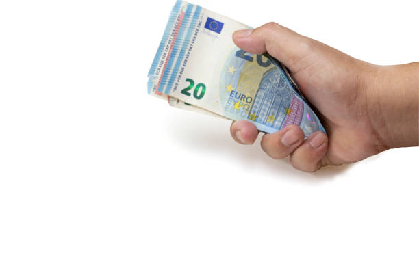 istock Hundred (100) dollar bill money on man 's hand holding isolate on white background, clipping path with pen tool, Recieves or payment by cash concept. 1257033227