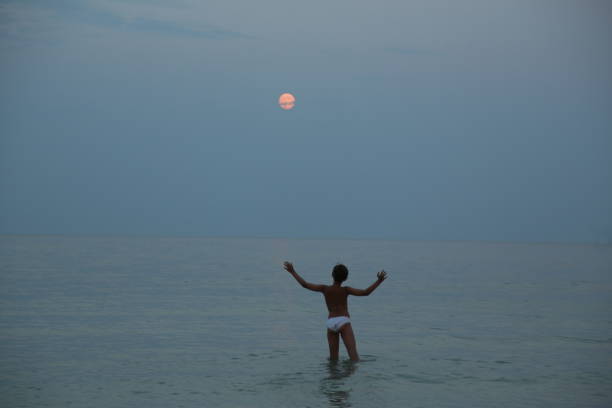 istock moon over the sea 1257035633