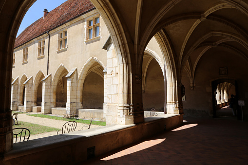 Europe. France. Auvergne-Rhône-Alpes. Ain. Bourg-en-Bresse. 08/05/2019. This colorful image depicts first cloister, says Hosts. The royal monastery of Brou.