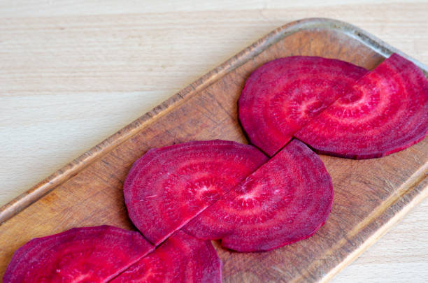istock Geometric pattern of raw beet slices. 1257039488