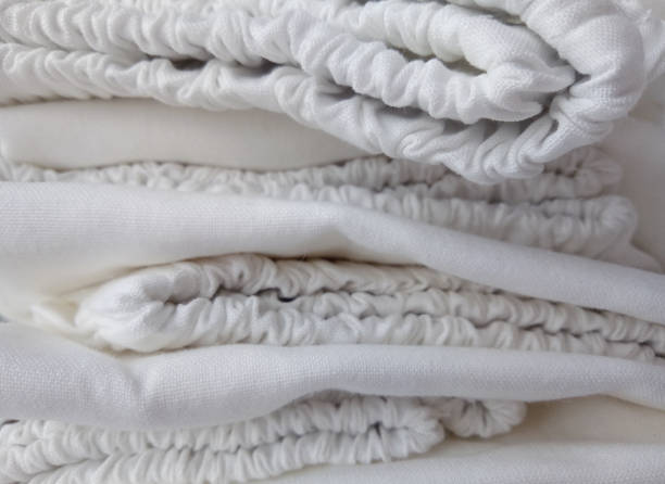 istock pile of stretchy waist pants 1257045018