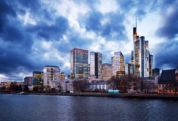 istock Blue cloudscape over Frankfurt skyline across the river Main 1257046094