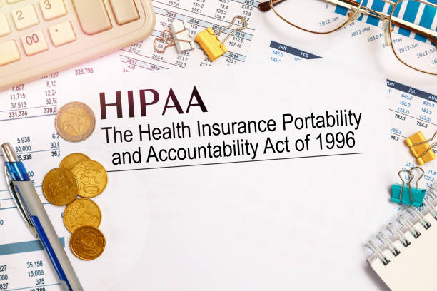 Paper with HIPAA The Health Insurance Portability and Accountability Act of 1996 stock photo