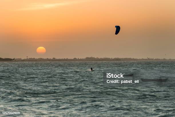 Kitesurf In Barra Grande During Sunset In Piauí Stock Photo - Download Image Now - Piaui State, Beach, Kiteboarding