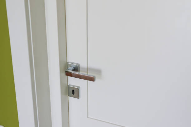 istock White wooden door closed 1257052748