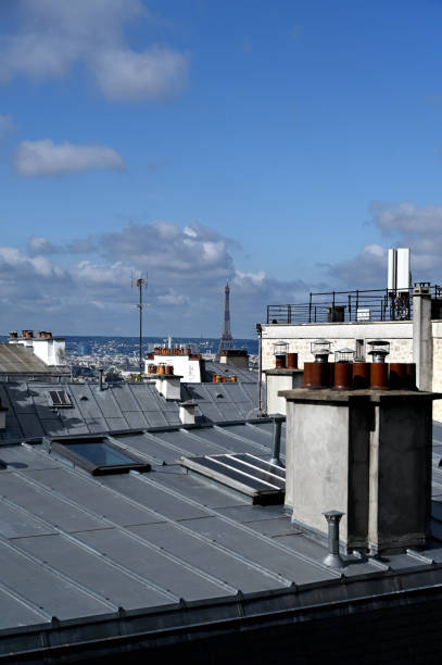 istock View over the roofs in Paris with Eiffel Tower in the background 1257056028