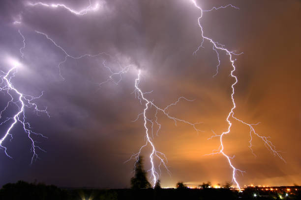 istock lightning bolts in the night sky during a thunderstorm 1257057705