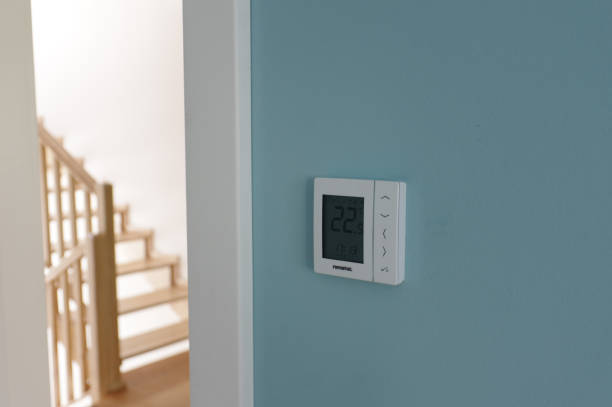 istock Electronic thermostat at home 1257058778