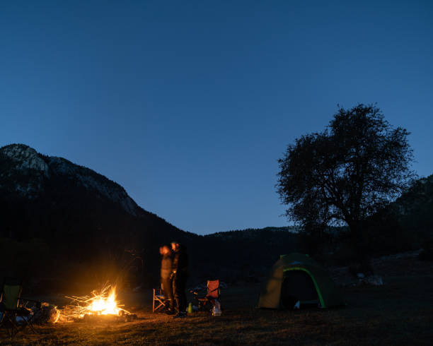 istock Friends Camping Under The Stars In Nature 1257060069