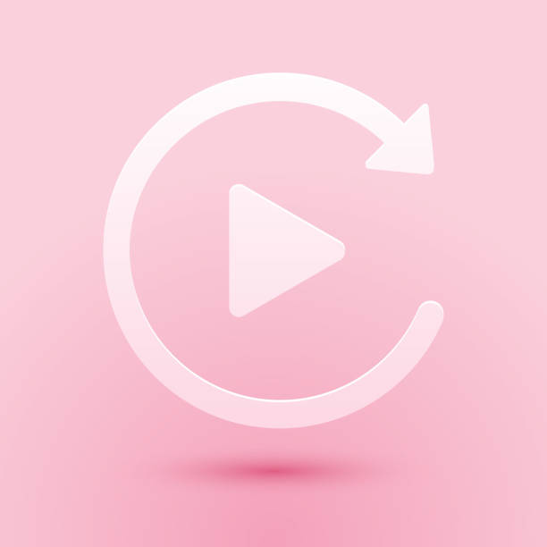 Paper cut Video play button like simple replay icon isolated on pink background. Paper art style. Vector Paper cut Video play button like simple replay icon isolated on pink background. Paper art style. Vector. replay stock illustrations