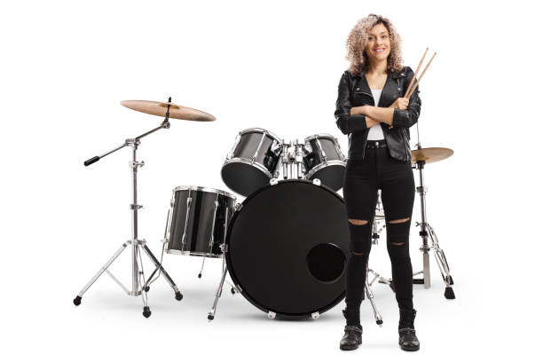 istock Young woman drummer holding drumsticks 1257065457
