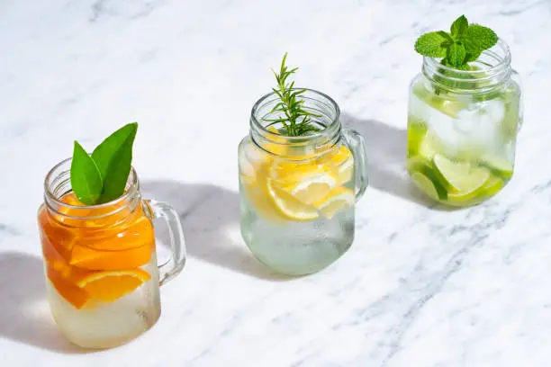 Photo of Citrus infused water non alcohol cocktails with orange, lemon and lime