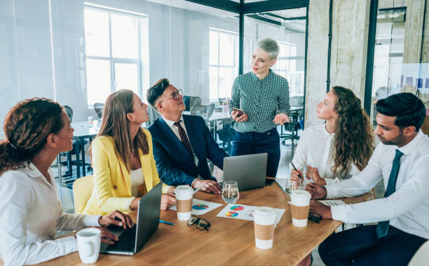 istock Female manager in team meeting. 1257066731