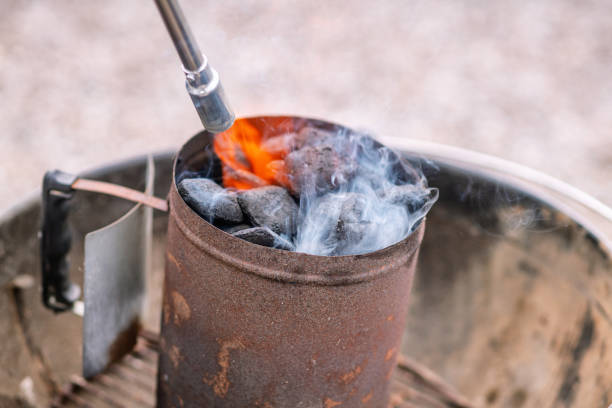 istock Coal heater on a grill with a gas flame 1257068045