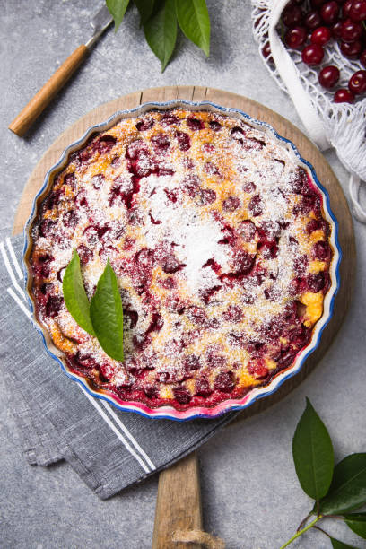 Cherry clafouti - traditional french sweet fruit dessert Cherry clafouti - traditional french sweet fruit dessert clafoutis stock pictures, royalty-free photos & images