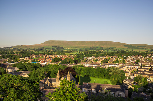 Summer in the Ribble Valley. Sun shining on Pendle hill