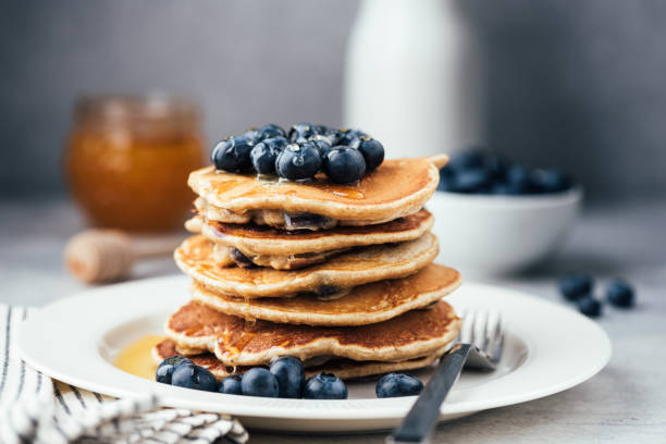 istock Oat pancakes with blueberries and honey 1257074546