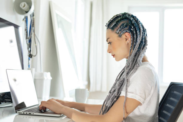 istock Young woman work at home 1257076150