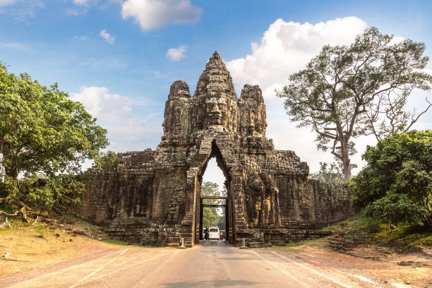 Row of sculptures in the Gate of in complex Angkor Wat in Siem Reap, Cambodia in a summer day
