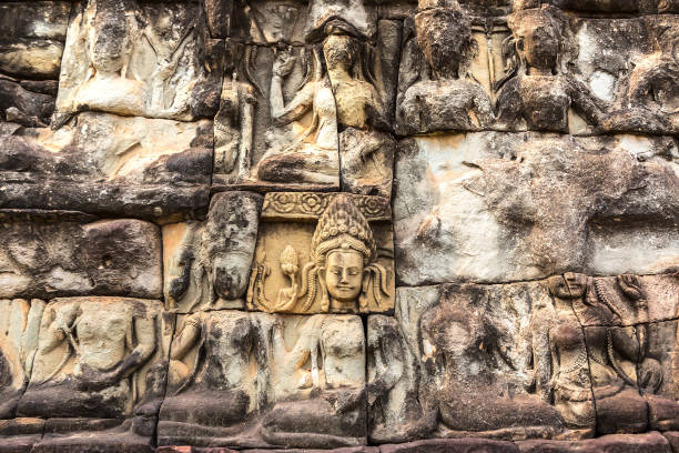 Sculpture on the wall Terrace of Elephants temple is Khmer ancient temple in complex Angkor Wat in Siem Reap, Cambodia