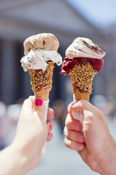 istock Ice cream cones in the hands 1257078580
