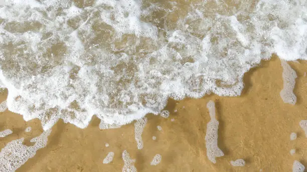 waves crashing on the beach. Omaha Beach, Normandy