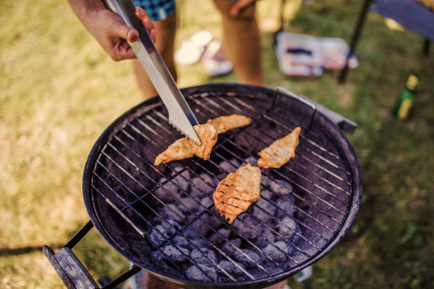 istock Grilling Meat on barbecue grill with coal 1257092792