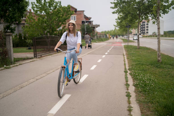 istock Young beautiful woman on a vintage bicycle. 1257096266