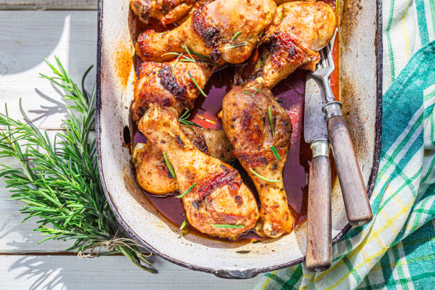 istock Spicy roasted chicken legs with rosemary in summer 1257102442