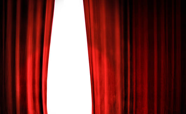 istock opening close up red stage curtain 1257104242