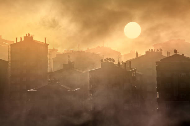 environmental air pollution concept of smog and cityscape stock photo