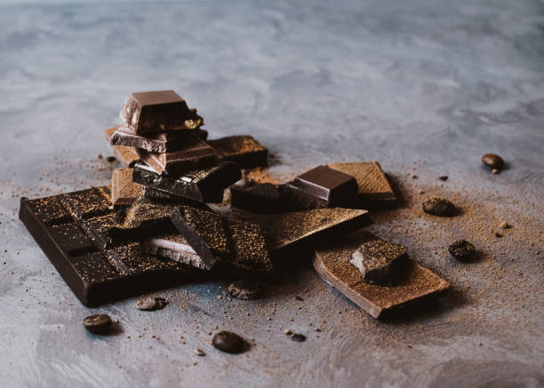 istock Chocolate pieces Template for posters and banners 1257104875