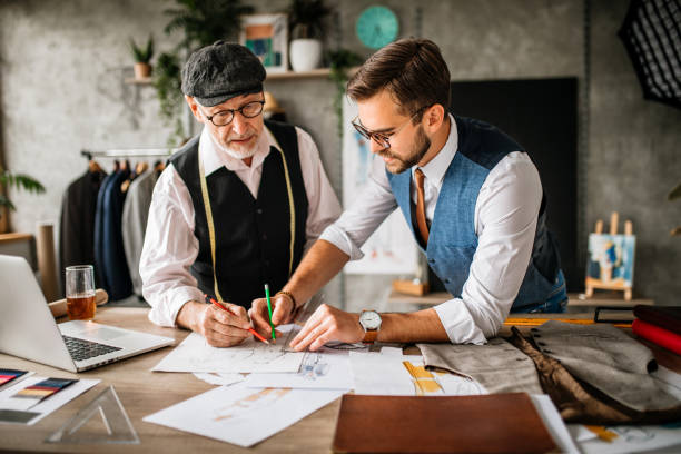 istock Teamwork in Fashion Design Tailor Studio 1257108726