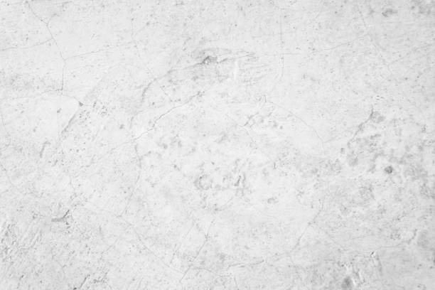 istock White concrete wall for interior or outdoor exposed surface polished. Cement have sand and stone of tone vintage, Grey natural concrete loft patterns old antique, design work floor texture background. 1257110791