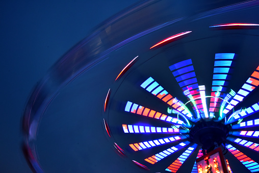 A longish exposure of a swing carnival ride.