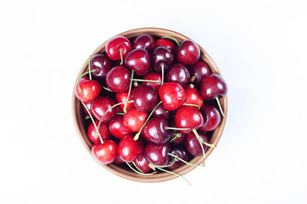 istock Cherry on plate bowl on white background 1257121161