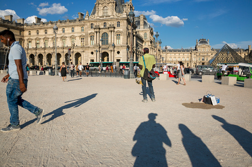 Paris, France - July 04, 2018: Souvenir trade near the Louvre pyramid in Paris.