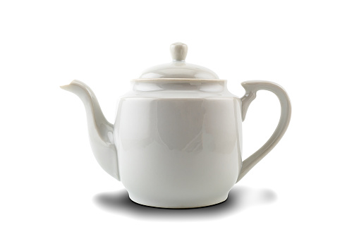 White ceramic tea pot isolated on white background with clipping path.