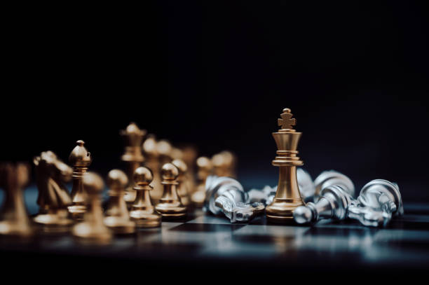 istock Leader and success business competition concept. Chess board game strategy 1257144762