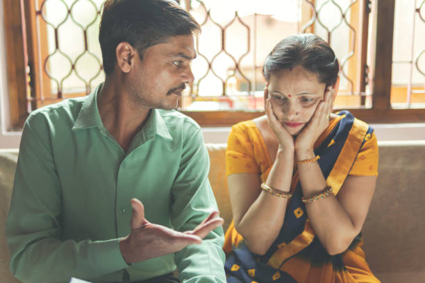 istock Indian mature couple worried about bills and having money problems. 1257147375