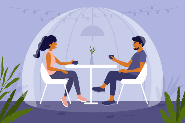 romantisches paar sitzt im café unter sicherheitskuppel und trinkt kaffee oder tee - kaffe auf glastisch stock-grafiken, -clipart, -cartoons und -symbole