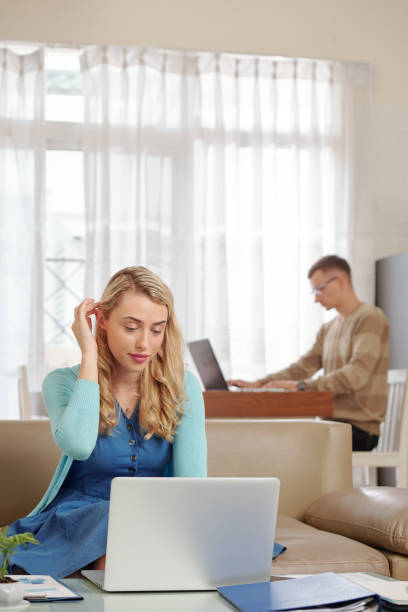 istock Woman working with paper and online document 1257151986