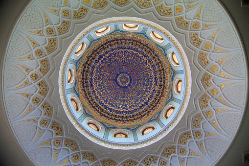 Beautiful painted dome with windows in the Tilla Sheikh Mosque of the Khast Imam complex. Tashkent. Uzbekistan. Apr 29, 2019
