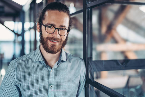 istock Smiling young businessman 1257155818