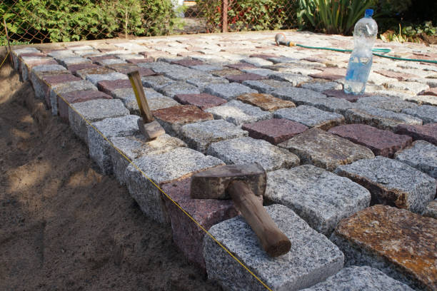 istock hammers in the yard of paving stones 1257156366