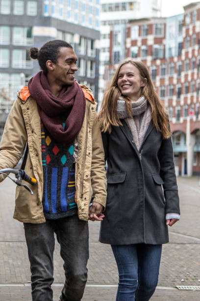 istock Multi ethnic university student couple going to classes in the Netherlands 1257157547
