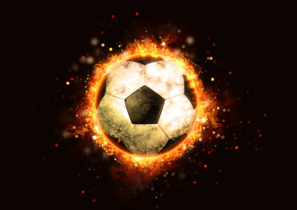 istock Soccer ball wrapped in flame 1257158500