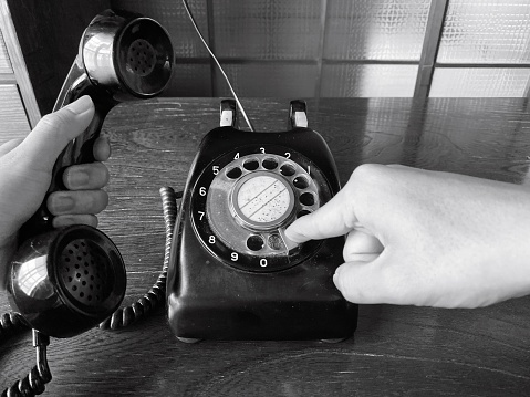 This is an old rotary dial phone.