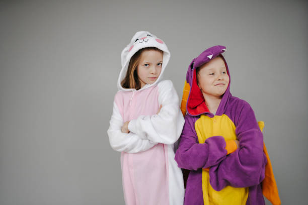 istock two girls dressed as rabbit and dragon posing 1257160023